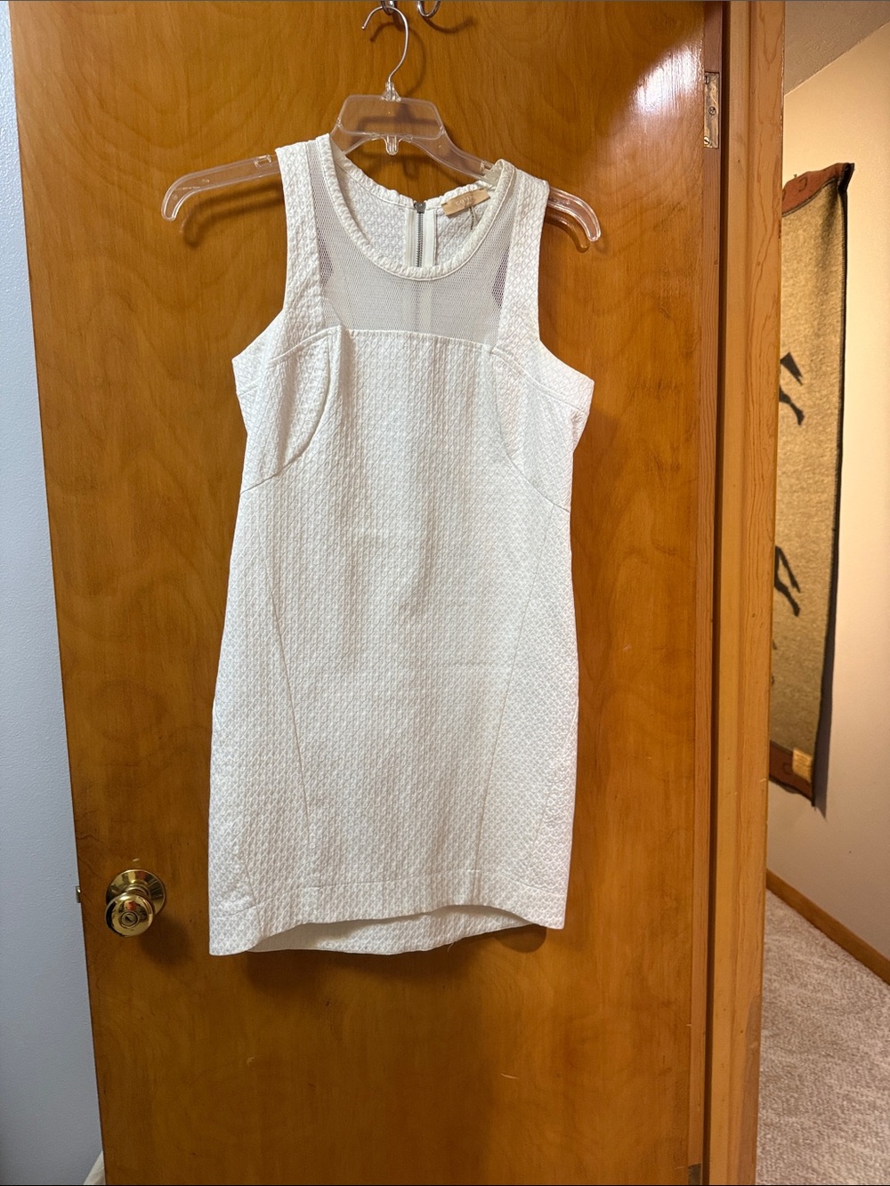 Sleeveless White Textured Sheath Dress